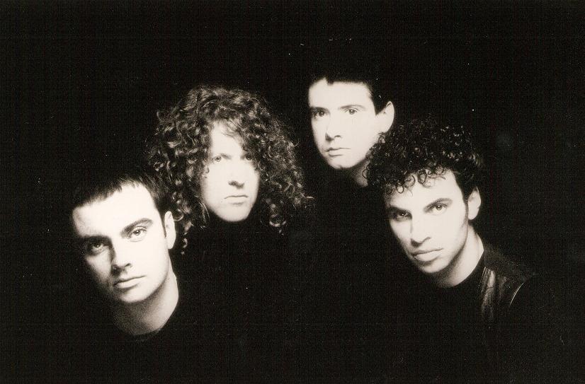 Noir photo of Catherine Wheel band members in a black background